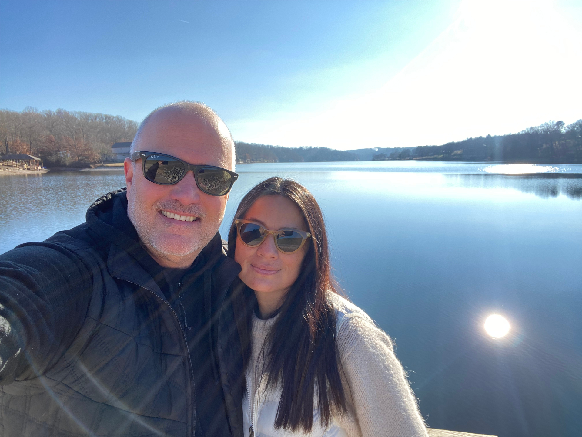Michael and Janneth on a sunny dock by the lake